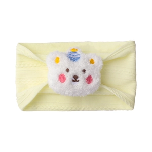 Detail of light yellow knitted baby headband with a 3D plush white bear and striped hat