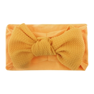 Fascia elastica per neonati con grande fiocco in maglia a nido d'ape arancione per bambini