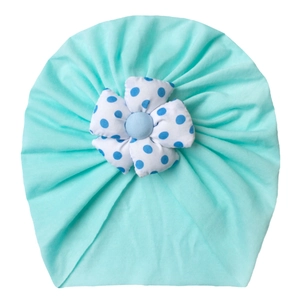 Breathable baby turban hat in light blue with decorative polka dot flower for summer