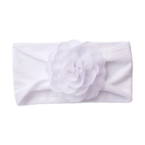 Close-up of soft purple chiffon flower detail on high-elasticity baby headband fabric