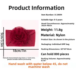 Détail d'un bandeau pour bébé en nylon rouge avec une grande fleur en tulle et tailles