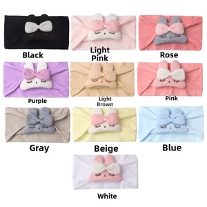 Detailed grid of soft nylon baby headbands with cute 3D plush bunny ears in ten colors