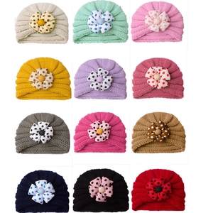 Baby knit turban hats with polka dot flowers in multiple colors for infants