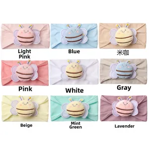 Detailed grid view of 9 pastel colored nylon baby headbands with plush bee decorations