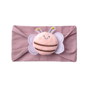 Close-up of baby nylon headband with dusty rose plush bee and soft knit texture