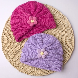 Cute knitted baby flower hats in rose red and light purple colors for autumn warmth