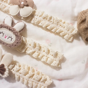 Lace baby headband set with crochet flowers and embroidered plush rabbit characters