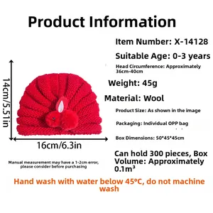 Detailed spec chart of a red knitted baby hat featuring cute plush bunny ears decoration