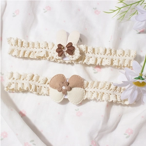 Charming lace baby headband set with bunny ears and floral bow on vintage floral fabric