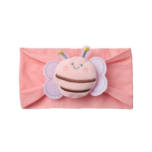 Detailed close-up of pink nylon baby headband with cute plush bee decoration