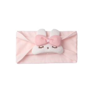Close-up of soft pink nylon baby headband with a cute white plush bunny detail