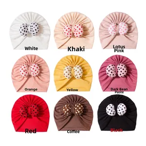 Detailed grid showing infant bow beanies in nine colors with polka dot patterns