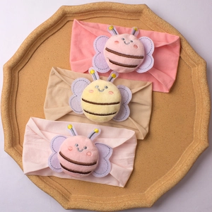 Baby nylon headband set with three colors and 3D plush bee decor in an octagonal tray
