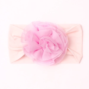 Bandeau souple rose pour bébé orné d'une grande fleur en maille pêche multicouche