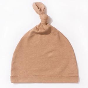 Soft light brown newborn baby knot hat made of premium warm knitted fabric