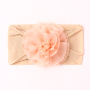 Bandeau bébé en nylon abricot doux avec une grande fleur en résille pour nouveau-nés