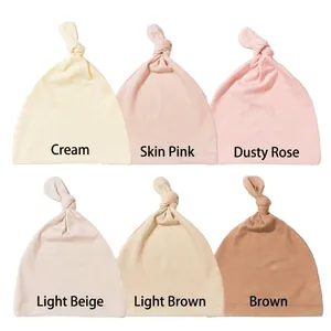 Soft knit newborn knotted hats in six Morandi colors including beige and coffee tones