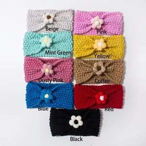 Close-up of soft knitted baby headbands in nine vibrant colors with crochet flowers