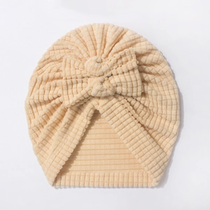 Newborn baby waffle knit turban hat with large bow in warm apricot solid color