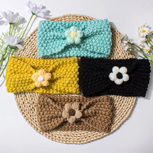Knitted stretch baby headband set featuring small daisy flowers in four candy colors