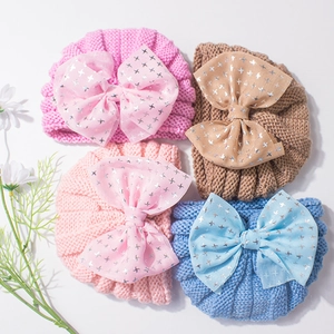 Cozy baby knitted turban hats with oversized star print mesh bows in four pastel colors