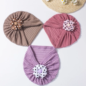 Detailed waffle knit baby turban hats with polka dot 3D floral accents in three colors