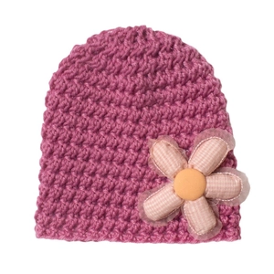 Pink knitted baby hat with soft fabric flower and mesh lace detail on white background