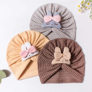 Set of 3 newborn knot beanies with cute bunny and bows in grey yellow and brown colors