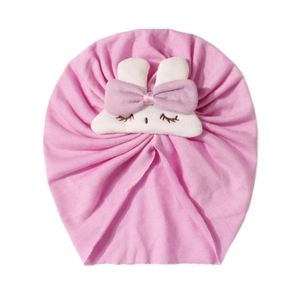 Turbante neonato rosa con simpatico coniglio di peluche bianco e tessuto morbidissimo