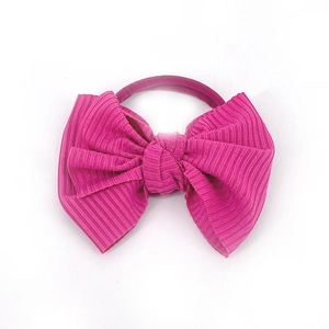 Lindo coletero de terciopelo rosa oscuro con lazo para bebé con textura de pana y elástico