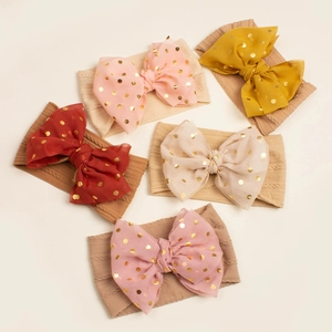 Set of 5 baby headbands with polka dot tulle bows in pink, yellow, and red colors