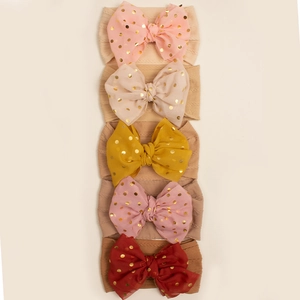 Set of 5 elastic baby headbands with large gold foil polka dot chiffon bows in various colors