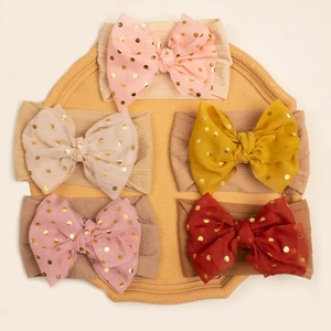 Set of 5 baby headbands with oversized gold dot bows in assorted warm earth tones