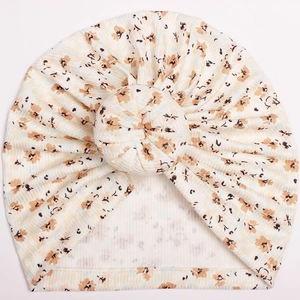 Floral print baby donut hat with ribbed fabric and soft decorative knot detail