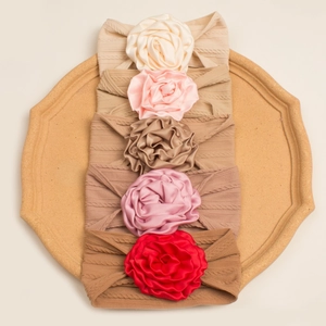 Set of 5 elastic baby headbands with handmade floral bows in neutral autumn colors