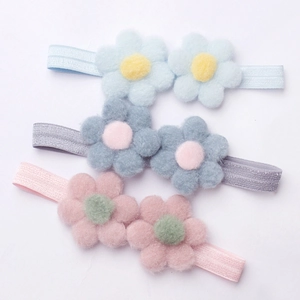 Lot de trois bandeaux élastiques mignons pour bébé avec des fleurs colorées en peluche