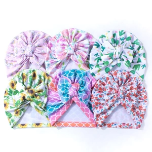 Collection of six soft floral printed baby turban hats with large bow knot details