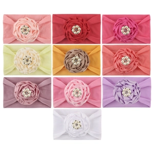 Set of ten colorful nylon baby headbands with soft ribbon flower and rhinestone centers