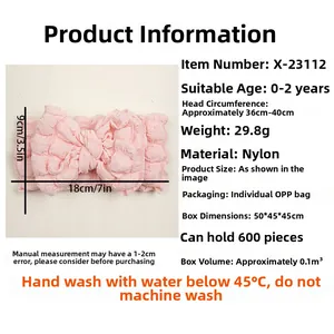 Pink nylon baby headband with large bow showing dimensions 9cm by 18cm detail