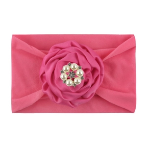 Pink nylon baby headband with soft satin rose, faux pearls and sparkling rhinestones