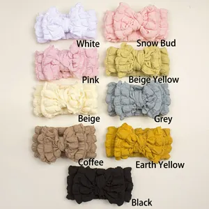 Detailed comparison of nine colored textured bubble fabric bow headbands for infants