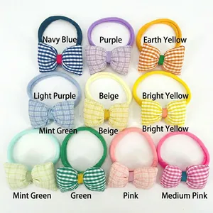 Set of 10 seamless nylon baby headbands with plaid bow ties in various soft colors