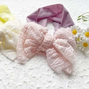 Three-piece baby headband set with soft lace bows in pink, yellow and beige colors