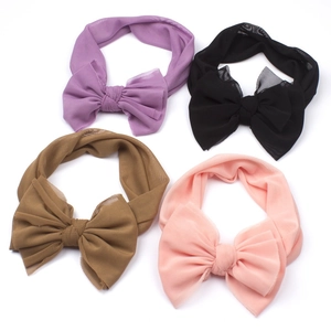Set of four breathable mesh baby headbands with large bows in soft pastel colors