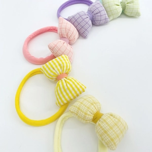 Set of five colorful fabric bow headbands with seamless soft nylon bands for infants