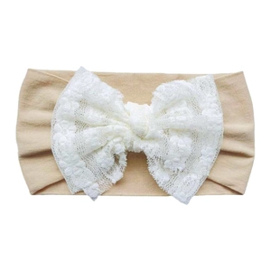 Baby headband with khaki elastic nylon band and large white lace bow accessory