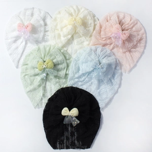 Set of six breathable lace baby beanies with cute bow knots in pastel colors for infants