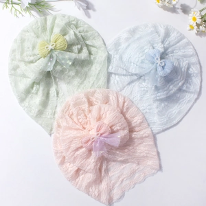 Lace baby headband hats with mesh bows and pearl details in pastel soft colors