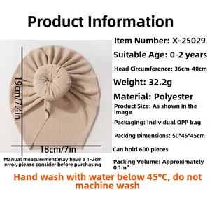 Detailed sizing chart for infant donut hat showing head circumference and material specs
