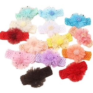 Bandeaux bébé avec fleurs en maille colorées et paillettes dorées en forme d'étoile